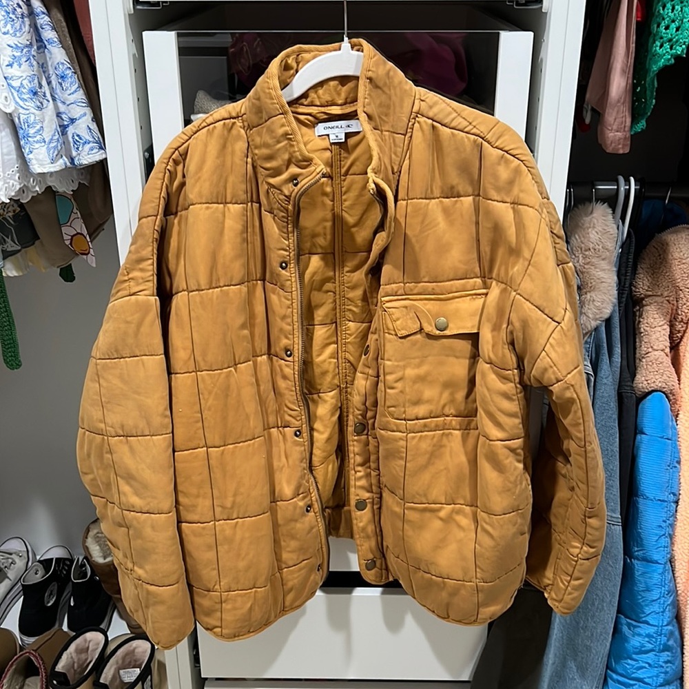 O’Neill quilted knit jacket. Size M burnt orange. Excellent condition.